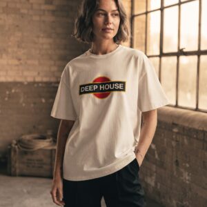 Deep House T-Shirt by SUPERWAPA, white oversized tee worn by a model