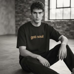 GOT SOUL T-Shirt by SUPERWAPA, black oversized tee worn by a model