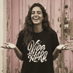 Vibe So Hard T-Shirt by SUPERWAPA, black oversized tee worn by a model