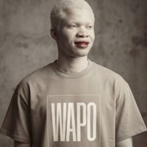 WAPO Oversized Faded T-Shirt by SUPERWAPA worn by a model